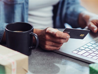 Person holding credit card