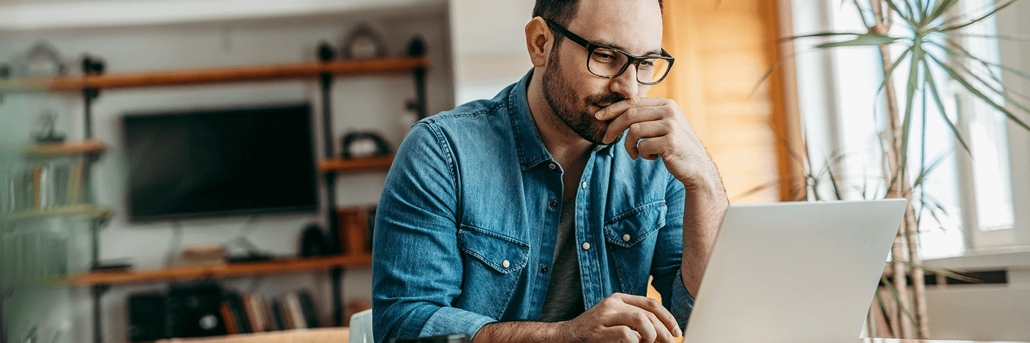 Man looking at a laptop